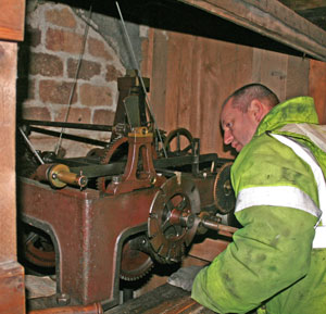 Checking the clock in the church tower